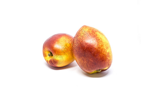 白底水果油桃背景图片