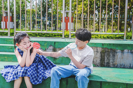 小学生分享棒棒糖背景图片