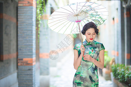 旗袍复古旗袍女性打伞背景