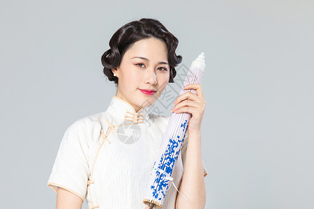 旗袍女性纸伞背景图片