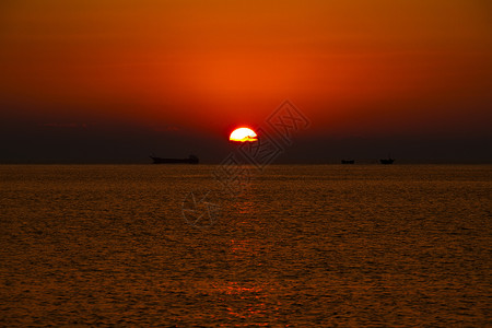 青岛海边日出背景图片