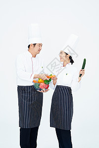 中餐服务员厨师与水果蔬菜背景