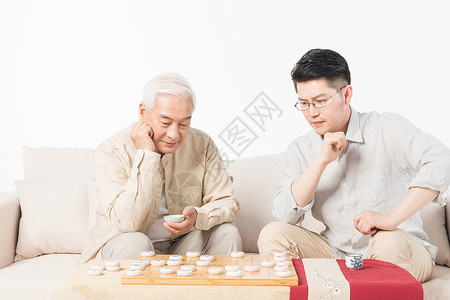 公园棋盘老年人父子下象棋背景