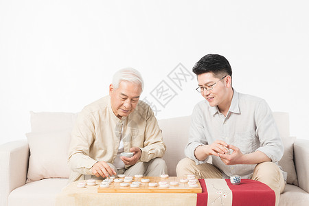 公园棋盘老年人父子下象棋背景