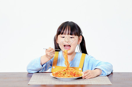 小女孩吃食物小女孩吃意面背景