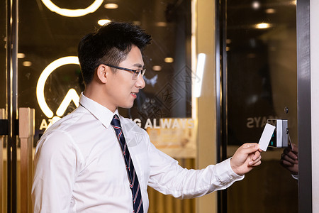 电梯刷卡商务男性刷门禁卡背景