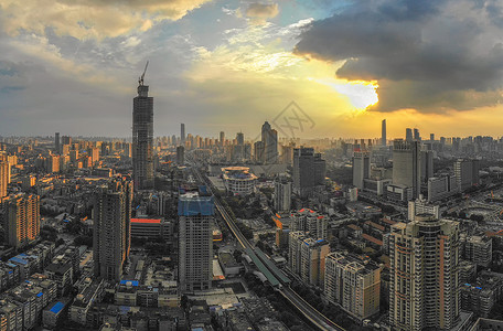 夕阳晚霞下的城市日落风光建筑群高清图片素材