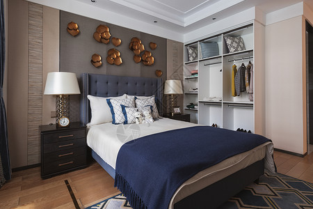 卧室大床房蓝色的被子高清图片