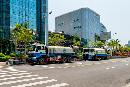 市政公园市政喷水车背景