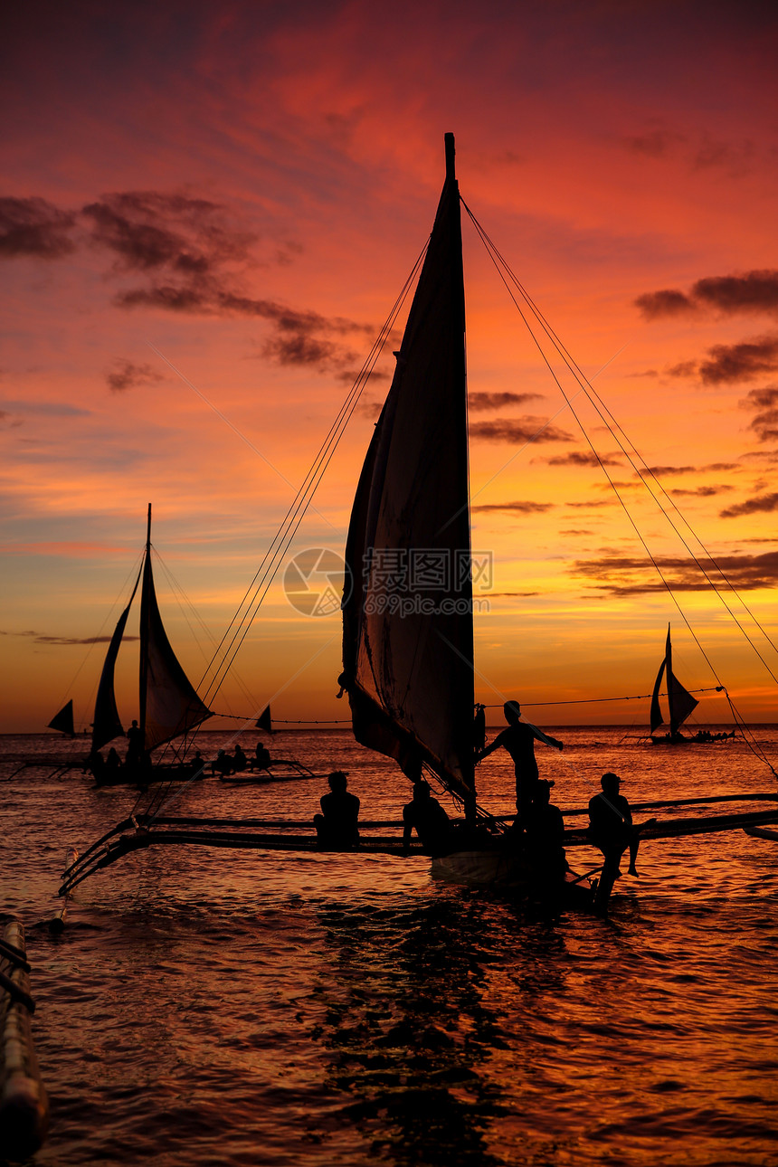 长滩帆船海上日落图片