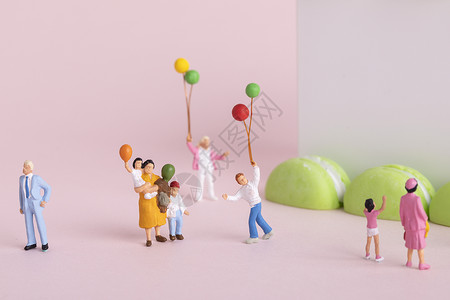 粉色卡通气球六一儿童节创意微距小人背景