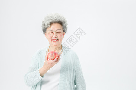 老人吃苹果老人吃苹果高清图片