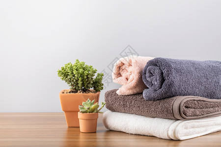 优质纯棉家居叠放在一起的毛巾背景