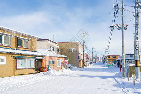 日本北海道雪地村庄背景图片