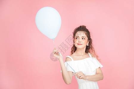美妆少女拿气球背景图片