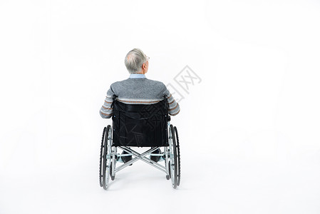 老年人腰椎坐轮椅老人背影背景