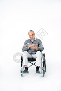 老人坐轮椅背景图片