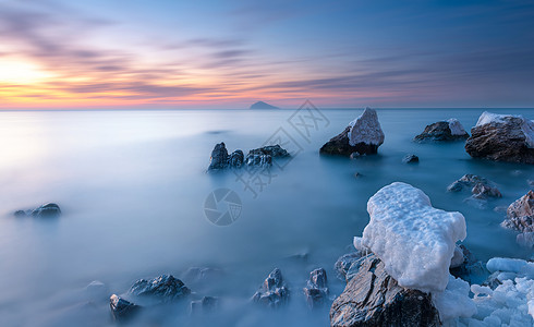 礁石海冰海岸风光背景