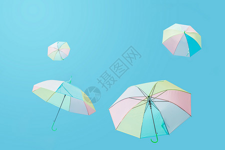 夏日卡通太阳伞飞上蓝天的彩色伞背景
