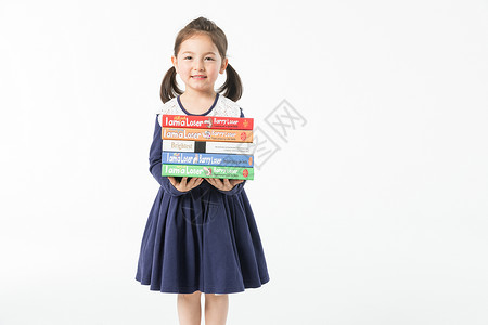 捧着书本的女孩外国儿童捧着书本背景