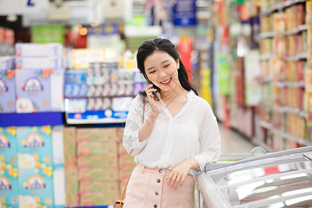 美女超市购物背景图片