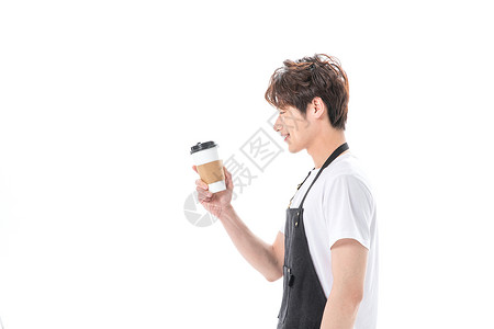 咖啡师拿着咖啡杯背景图片