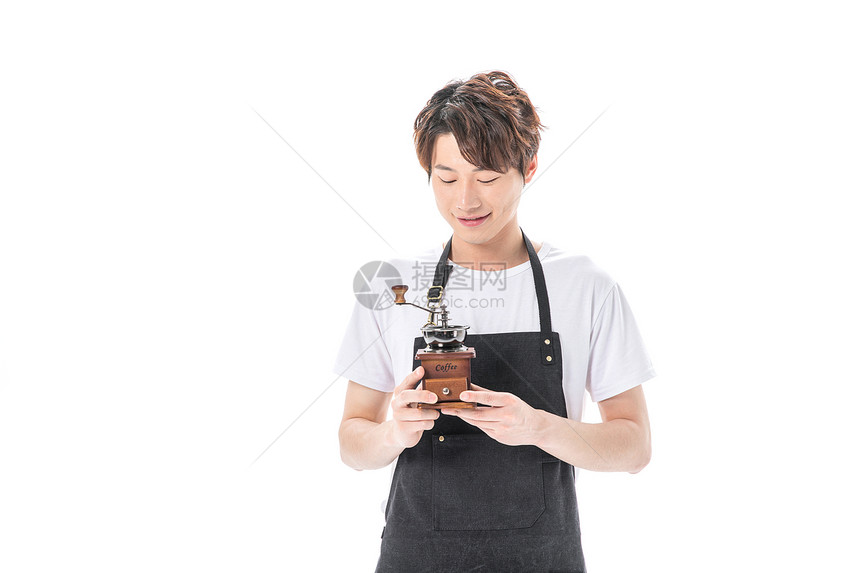 咖啡师研磨咖啡图片