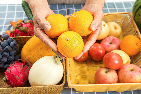 食品农产品捧着水果的双手背景