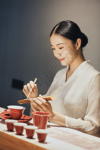 女性泡茶师背景图片