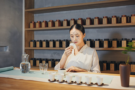 茶艺女女茶艺师闻香背景