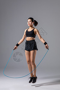 一根塑料跳绳女性运动跳绳背景
