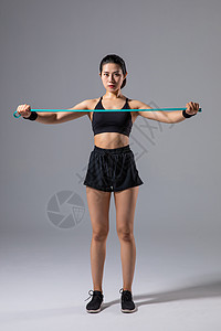 弹力肠运动女性弹力绳健身背景