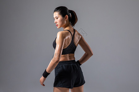 运动女性背部肌肉背景图片