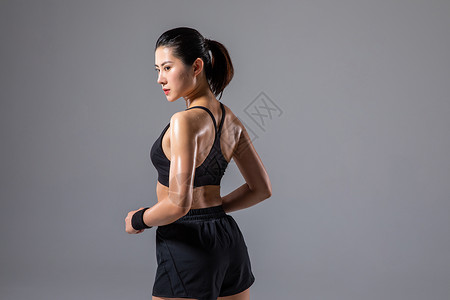 健身背部运动女性背部肌肉背景