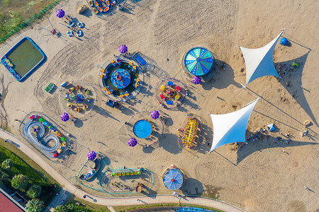 土地市场航拍沙滩上的儿童游乐场背景
