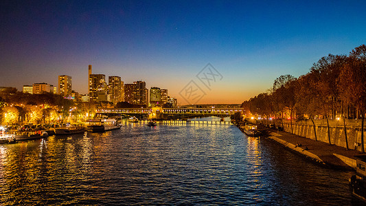 知名景点夜景法国巴黎塞纳河夜景背景