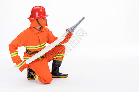 消防服消防员使用消防水枪背景