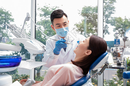 牙科手术椅牙科医生做手术背景