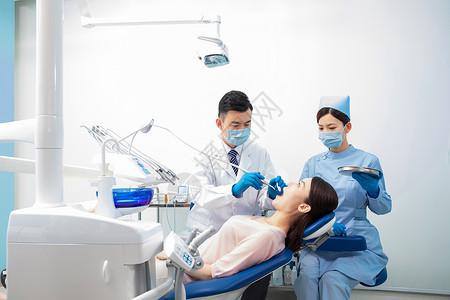 超声波洗牙牙科医生做手术背景