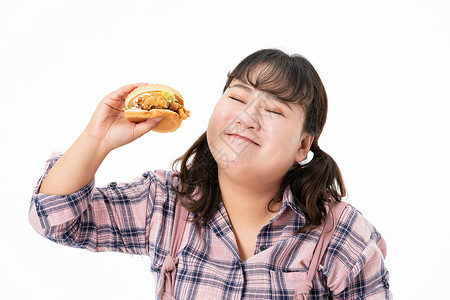 美食女孩胖女孩开心吃汉堡背景