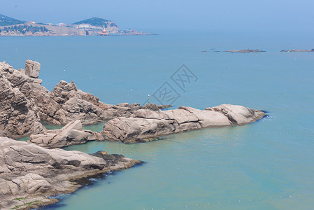 快递成山威海荣成成山头海滨风光背景