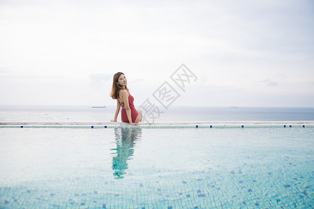 肚子旅行海边泳池美女背景