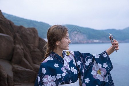 和服美女手机自拍海边和服美女自拍背景