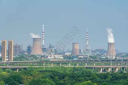 公路旁工厂烟囱净化炉环保环境背景图片