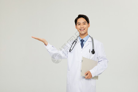 年轻男性医生欢迎手势高清图片