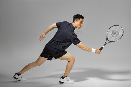 运动男性打网球背景图片