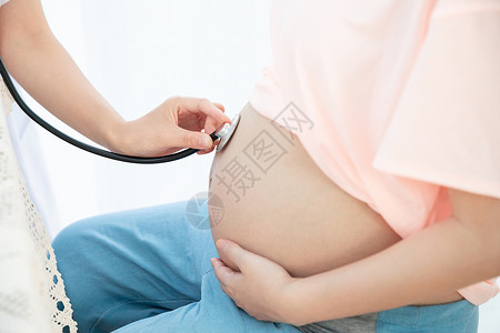 听肚子孕妇医生听诊器背景