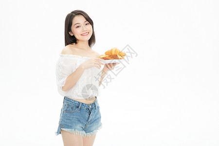 美女吃面包背景图片