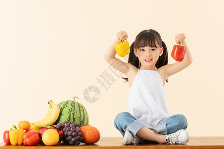 萌萌水果图标小女孩手拿蔬菜背景