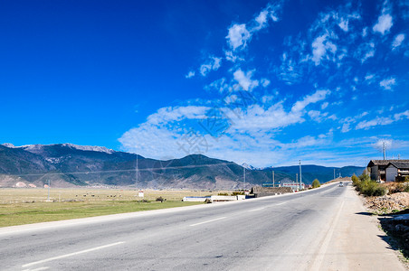 西藏高原马路道路图背景图片